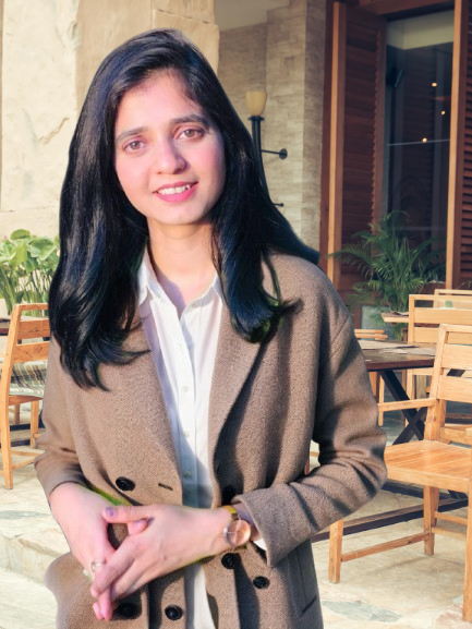 Dt. Alka Pal, dietitian in Noida, smiling in a beige blazer